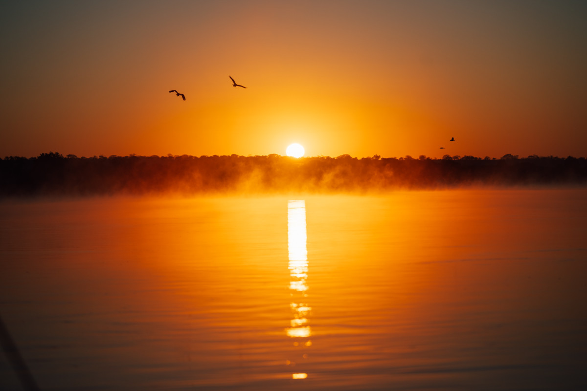 Solnedgang over Zambezi-elven   |    Foto:  Chundukwa River Lodge 